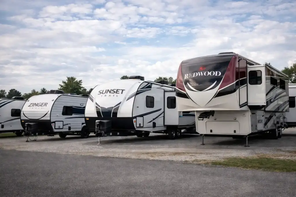 CrossRoads RV travel trailers and fifth wheels parked side by side